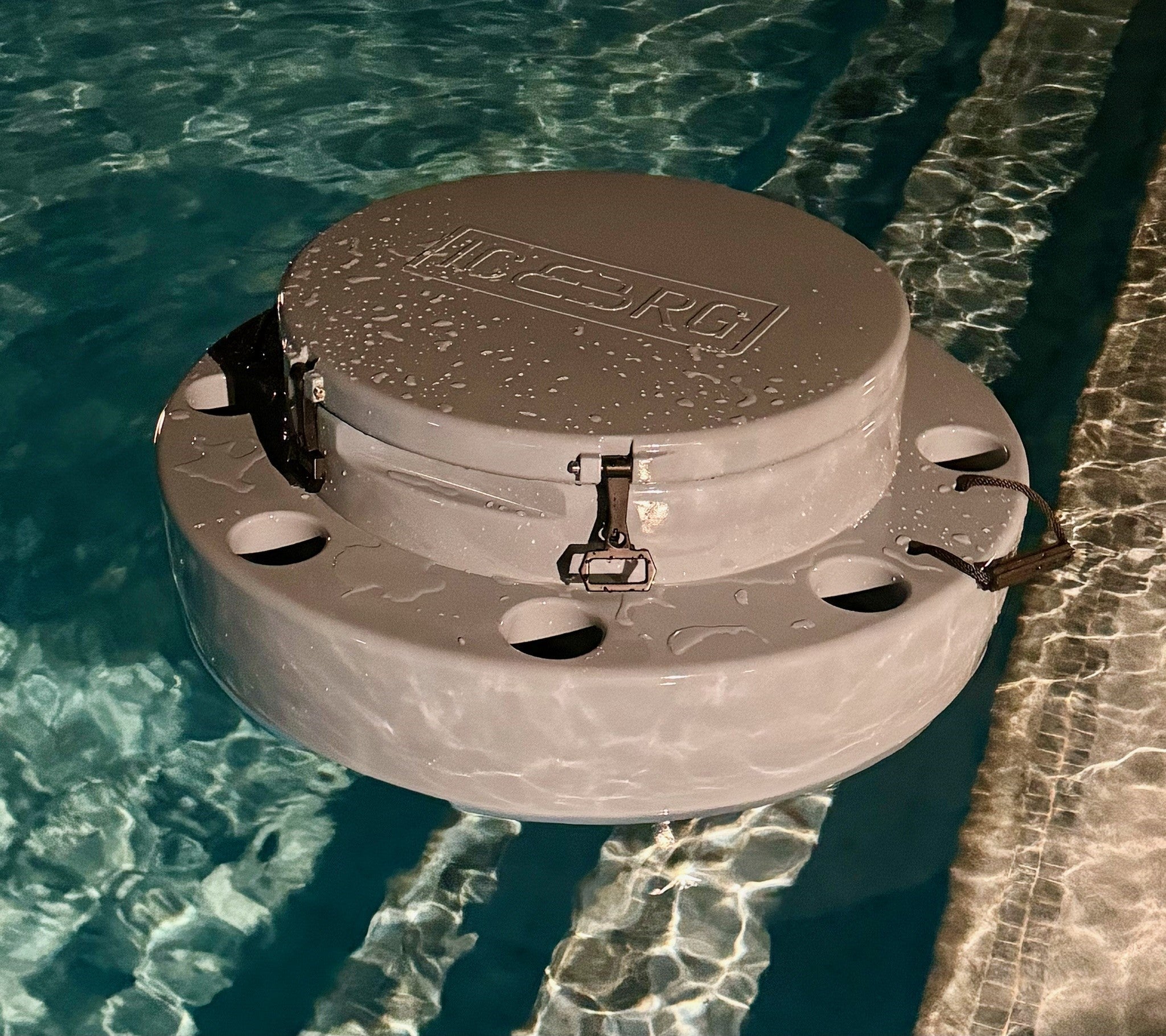 Charcoal ICEBRG floating cooler in pool